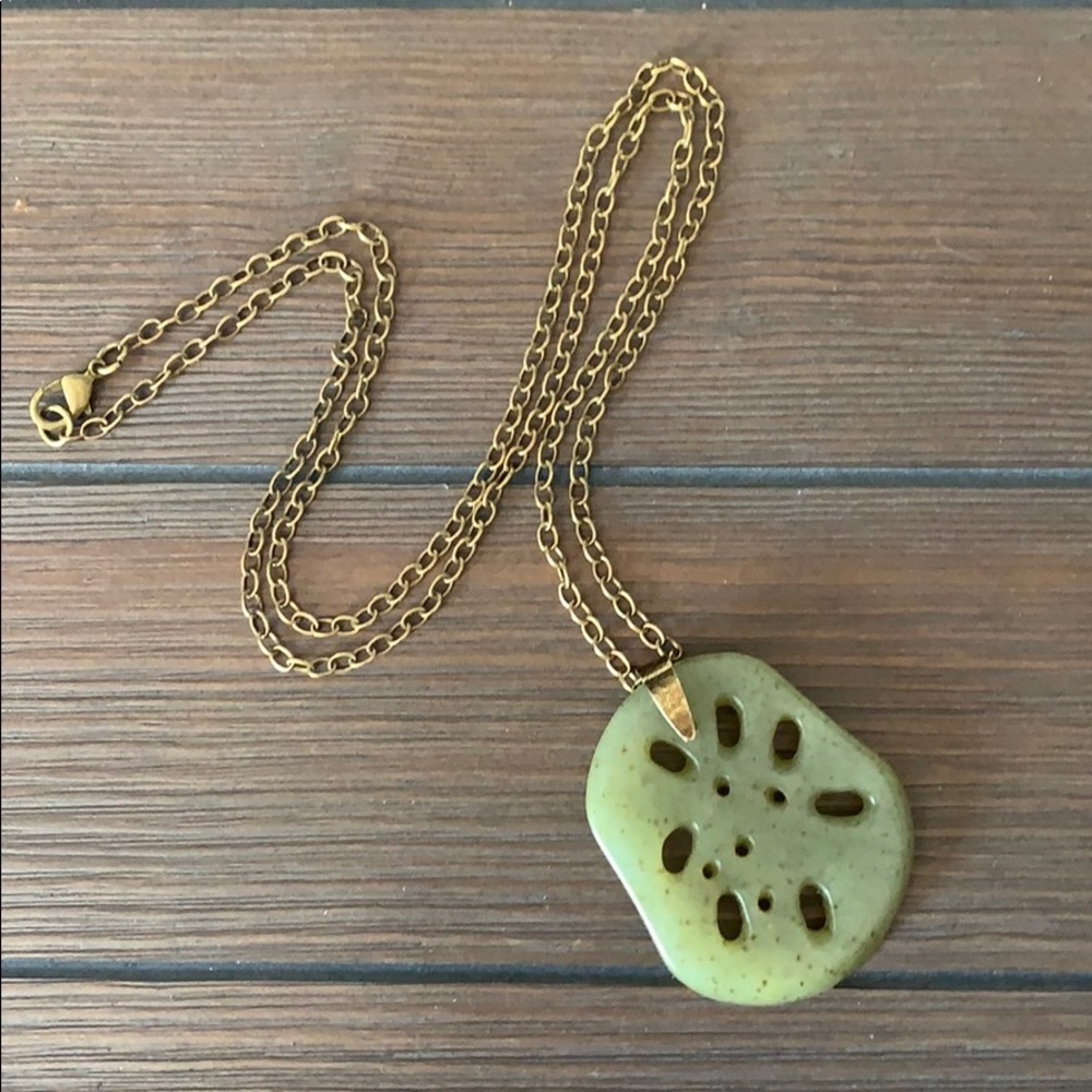 Andrew Marc Lotus slice Jade Pendant.